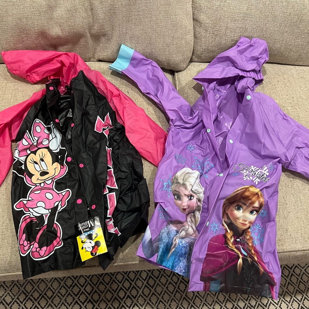 Kids Disney rain coats. NWT. Size small and large